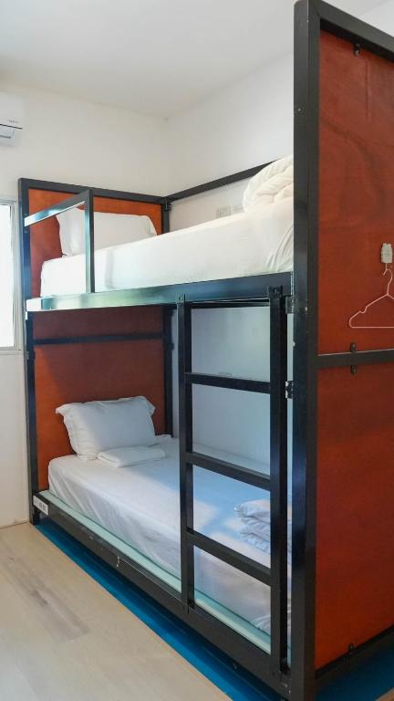 Postel nebo postele na pokoji v ubytování Green Gen Hotel, Mueang Phuket