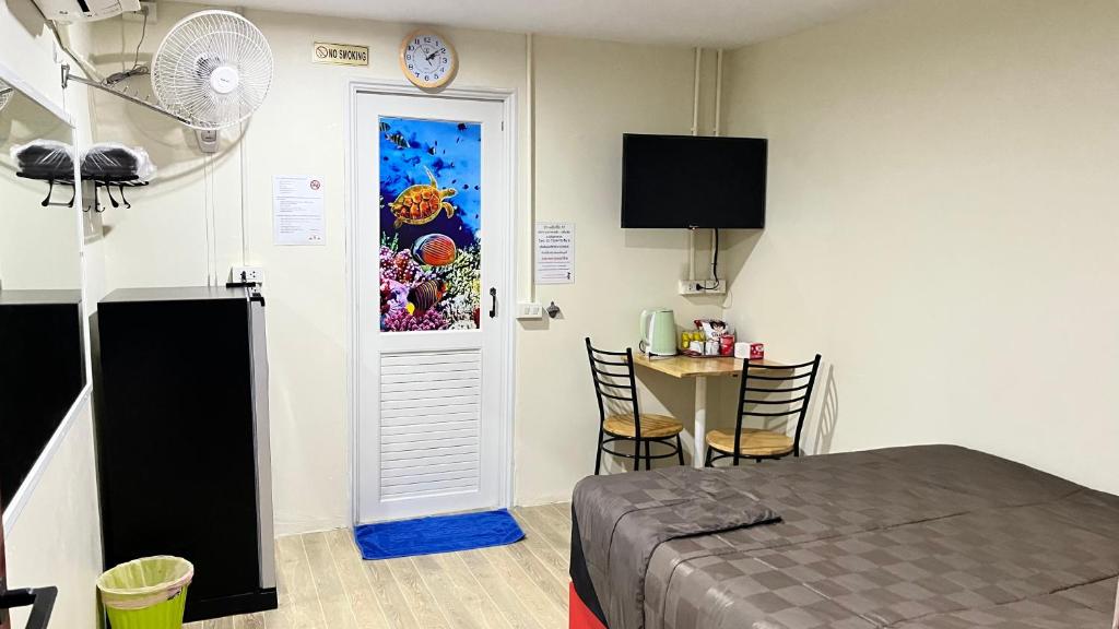 TV a/nebo společenská místnost v ubytování Pa Chalermchai Guesthouse