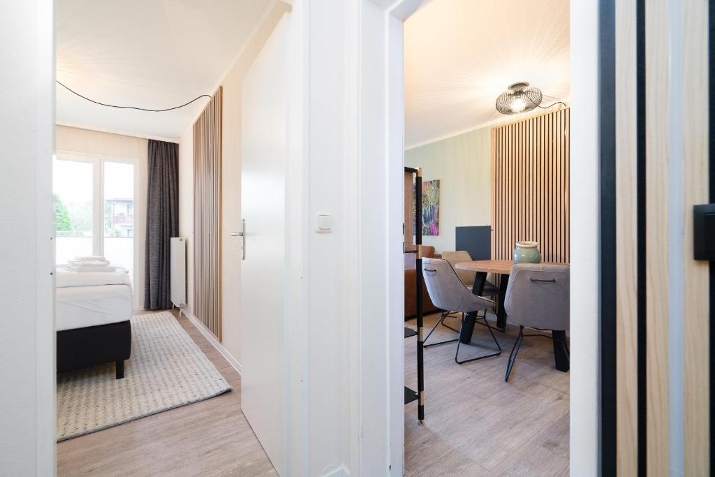 Postel nebo postele na pokoji v ubytování Das Solaris 3 Beach Apartment mit Balkon, Gemeinschaftssauna und Grillplatz