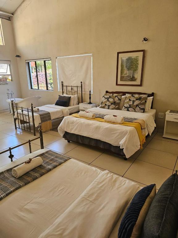Tzaneen White House Lodge - 带花园的四倍房间