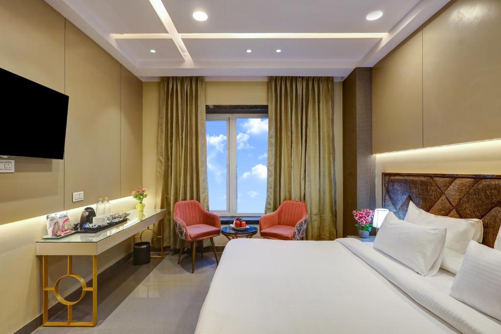 Postel nebo postele na pokoji v ubytování The Viking - Luxury living steps away from New Delhi & Connaught Place