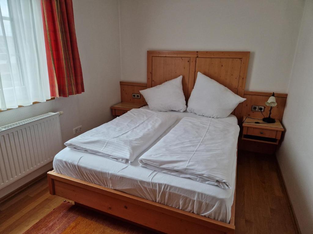Postel nebo postele na pokoji v ubytování Landgasthof Krone
