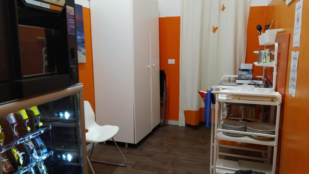 A kitchen or kitchenette at CconfortHotels Host Dolci Risvegli
