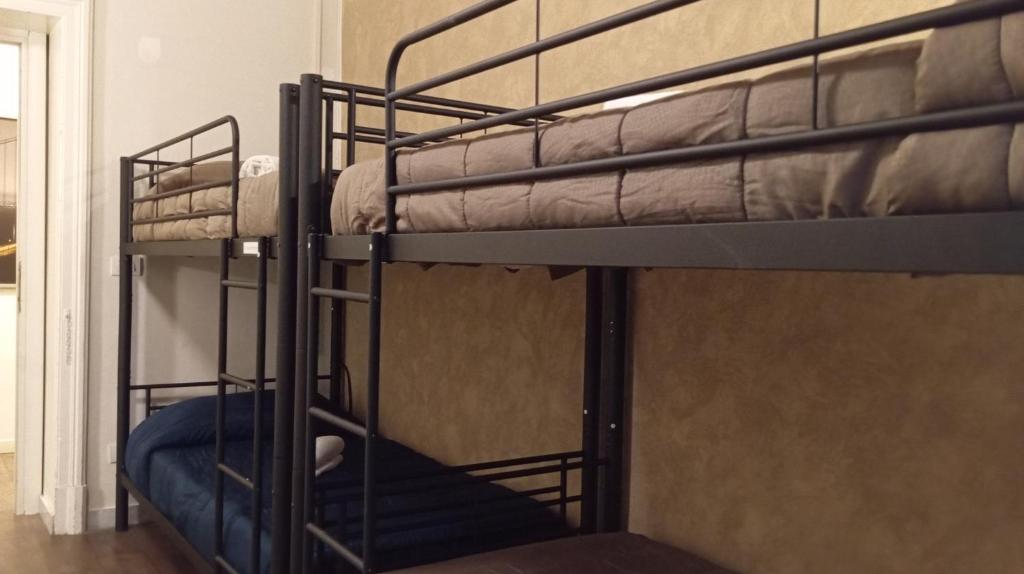 A bed or beds in a room at CconfortHotels Host Dolci Risvegli