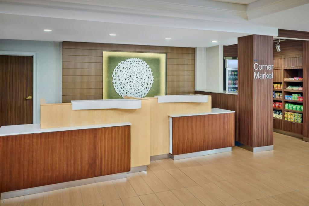 a waiting room with a counter in a store at Fairfield Inn & Suites by Marriott Ottawa Kanata in Ottawa