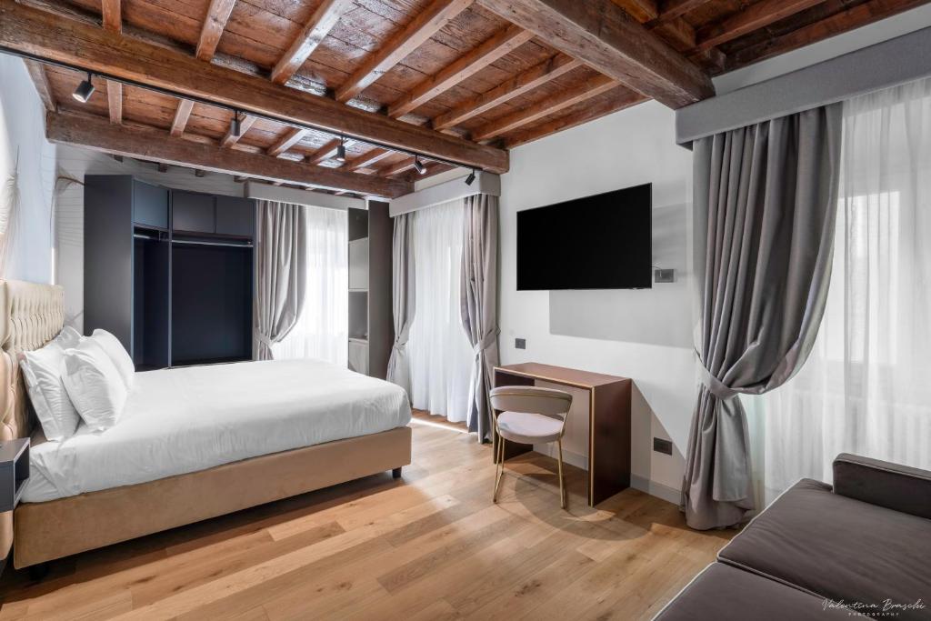 Postel nebo postele na pokoji v ubytování Hotel Adamas