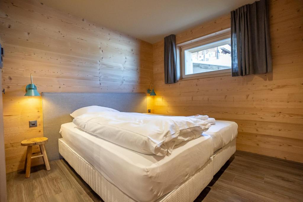 Postel nebo postele na pokoji v ubytování Chalet Onno Myriam