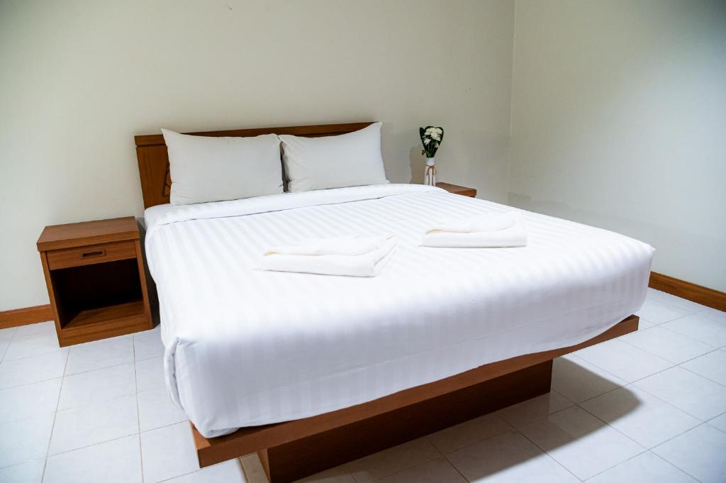 Postel nebo postele na pokoji v ubytování Diamond Place Ao Nang