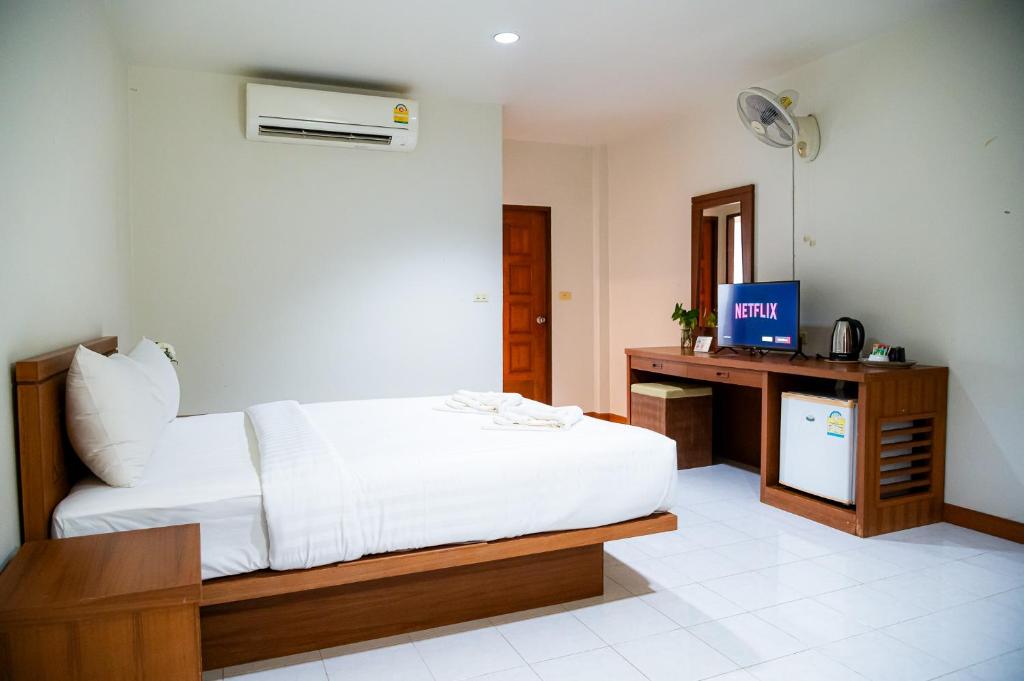Postel nebo postele na pokoji v ubytování Diamond Place Ao Nang