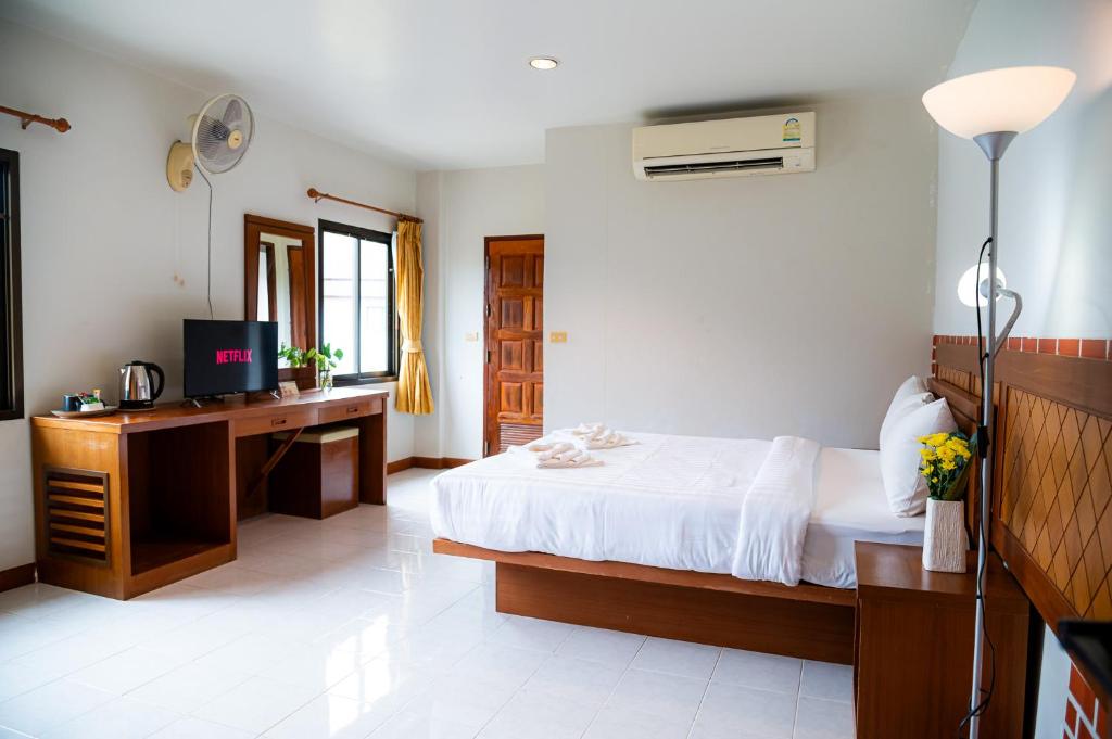 Postel nebo postele na pokoji v ubytování Diamond Place Ao Nang