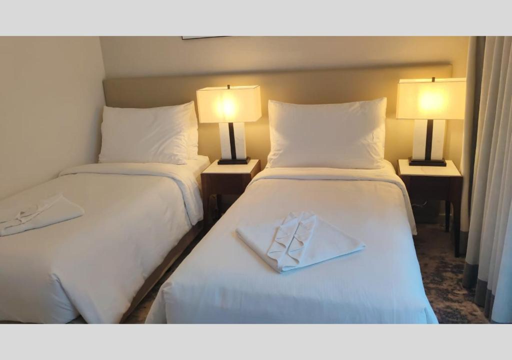 Postel nebo postele na pokoji v ubytování Address Beach Resort Fujairah - Apartments