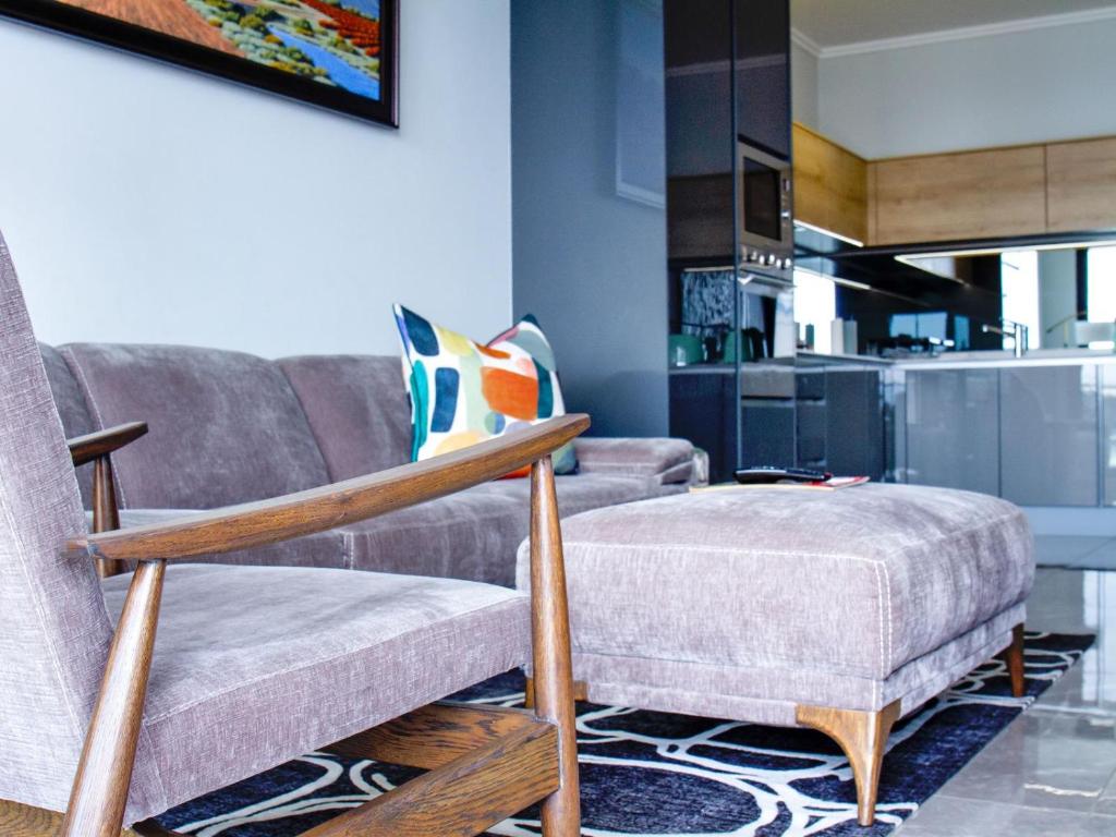 Posezení v ubytování Ellipse Waterfall Executive Two Bedroom