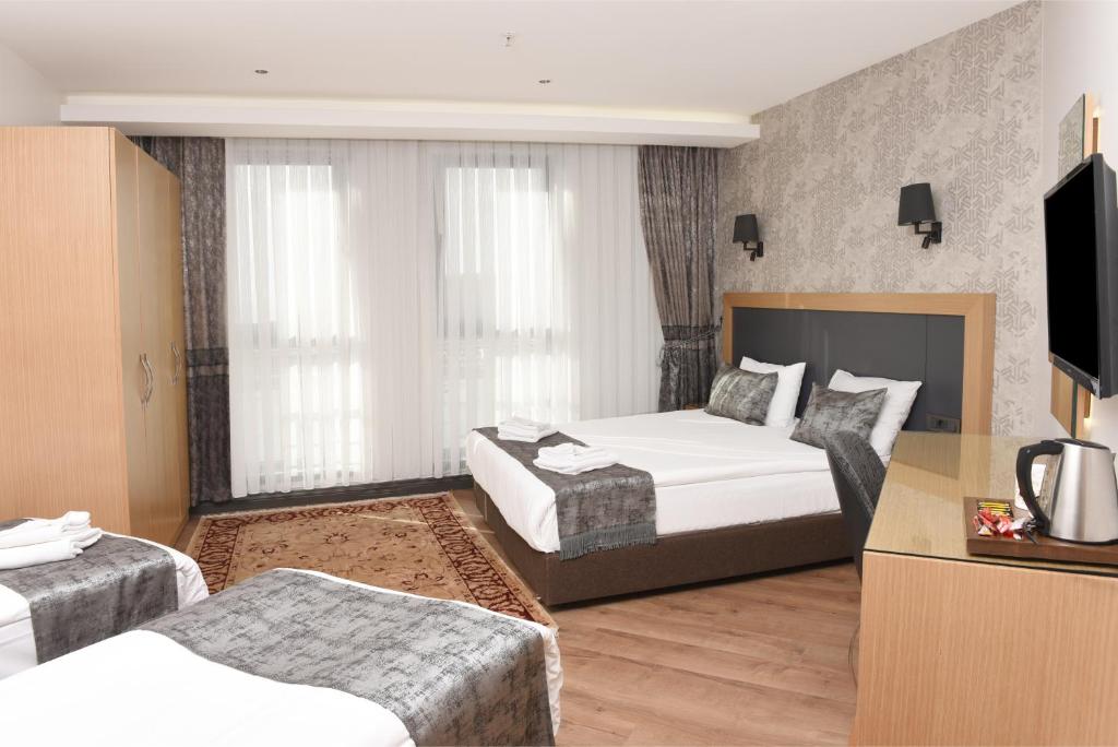 Postel nebo postele na pokoji v ubytování Gulec Hotel & Spa - Special Category