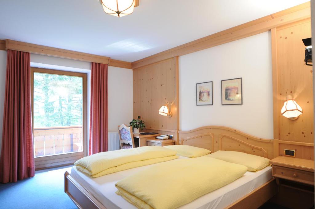 Posteľ alebo postele v izbe v ubytovaní Sport Hotel Wildgall