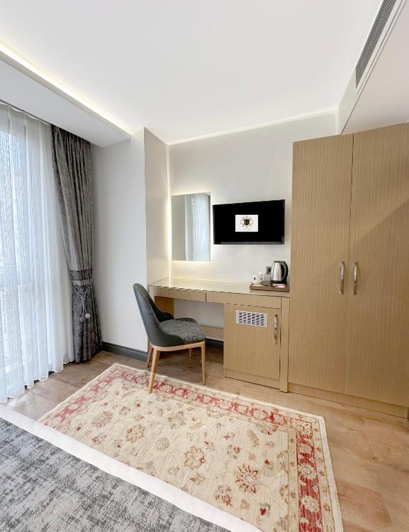 TV a/nebo společenská místnost v ubytování Gulec Hotel & Spa - Special Category