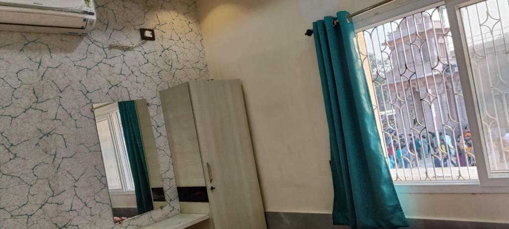 Vannituba majutusasutuses Rameshwaram Guest House