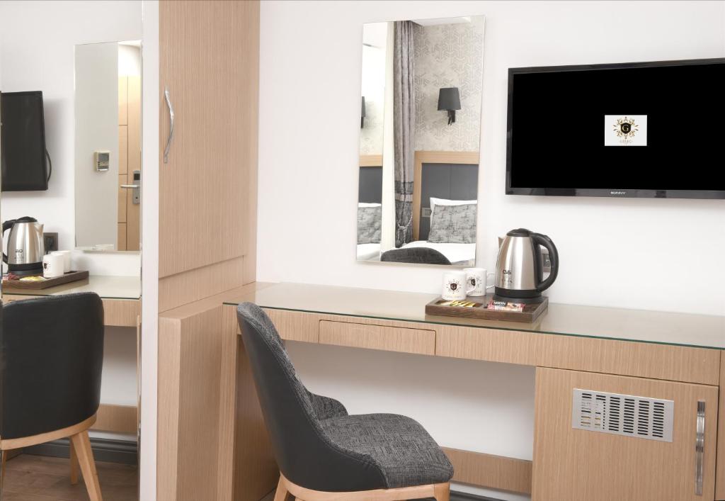 Příslušenství pro přípravu čaje a kávy v ubytování Gulec Hotel & Spa - Special Category