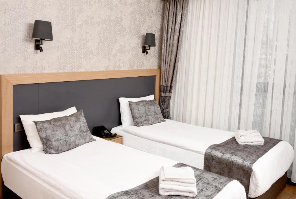 Postel nebo postele na pokoji v ubytování Gulec Hotel & Spa - Special Category