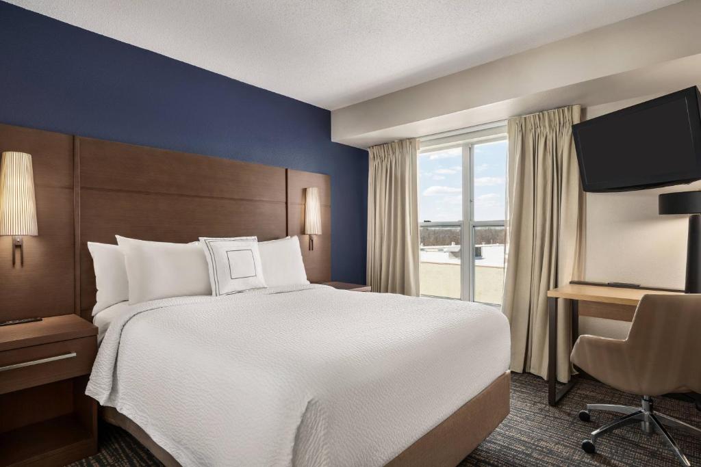 Postel nebo postele na pokoji v ubytování Residence Inn Deptford