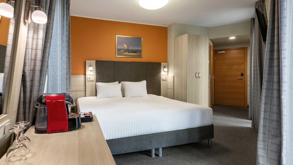 Postel nebo postele na pokoji v ubytování Wellton Riga Hotel & SPA