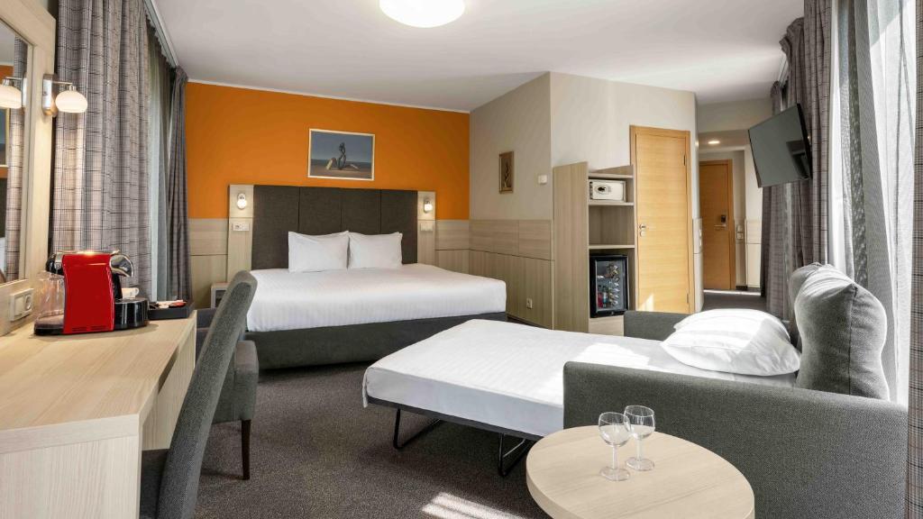 Postel nebo postele na pokoji v ubytování Wellton Riga Hotel & SPA