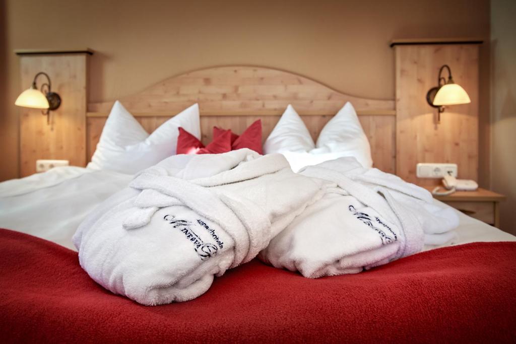 Postel nebo postele na pokoji v ubytování Apparthotel Minerva Diana Octavia