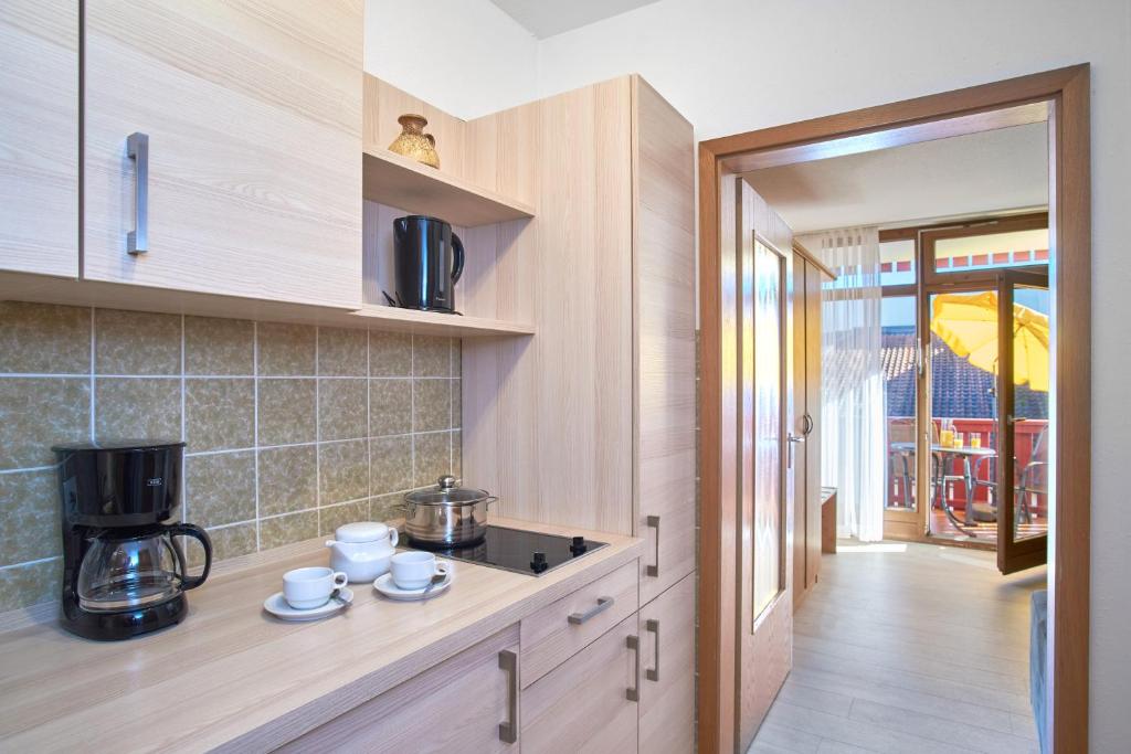 Kuchyň nebo kuchyňský kout v ubytování Apparthotel Minerva Diana Octavia