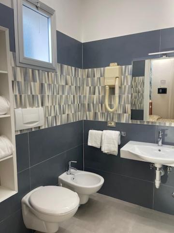 Koupelna v ubytování Hotel Coralba