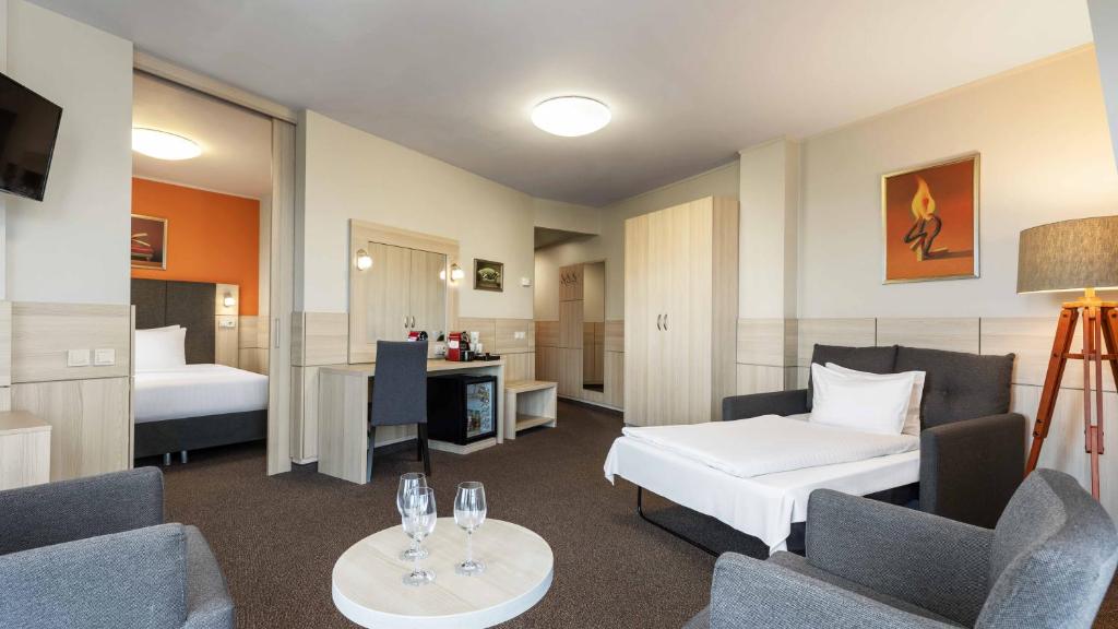 Postel nebo postele na pokoji v ubytování Wellton Riga Hotel & SPA