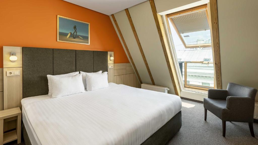 Postel nebo postele na pokoji v ubytování Wellton Riga Hotel & SPA
