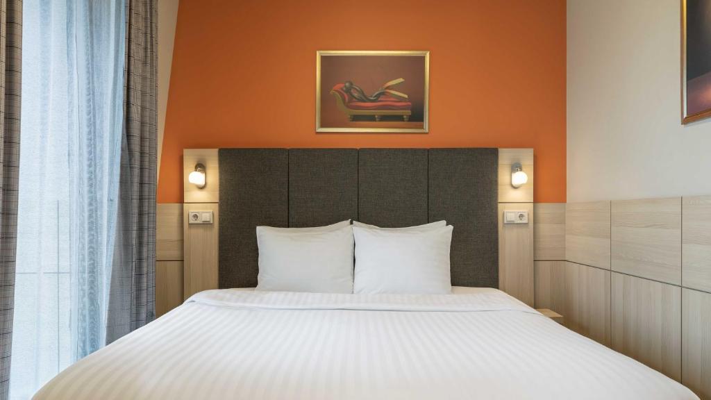 Postel nebo postele na pokoji v ubytování Wellton Riga Hotel & SPA