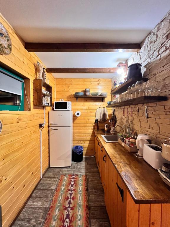 Kuchyň nebo kuchyňský kout v ubytování Green Cabin