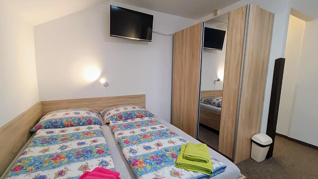 Postel nebo postele na pokoji v ubytování Pension 444 - Ski Resort Herlikovice and Bubakov