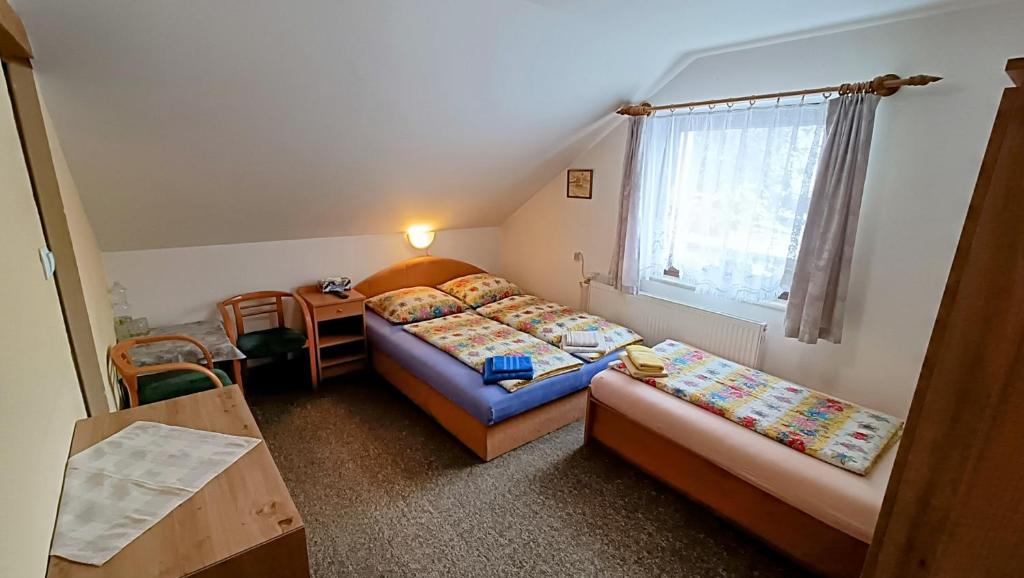 Postel nebo postele na pokoji v ubytování Pension 444 - Ski Resort Herlikovice and Bubakov