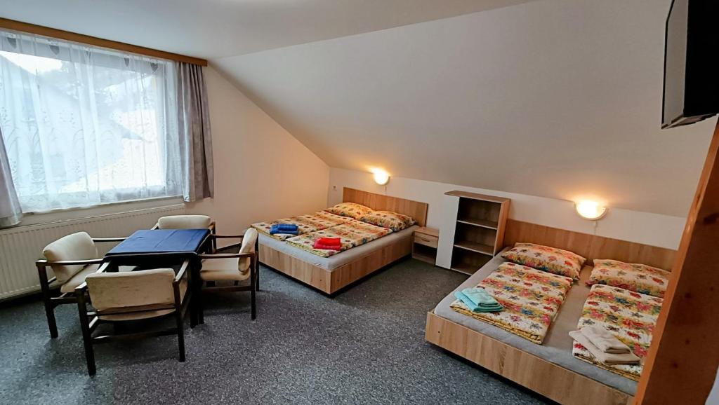 Postel nebo postele na pokoji v ubytování Pension 444 - Ski Resort Herlikovice and Bubakov