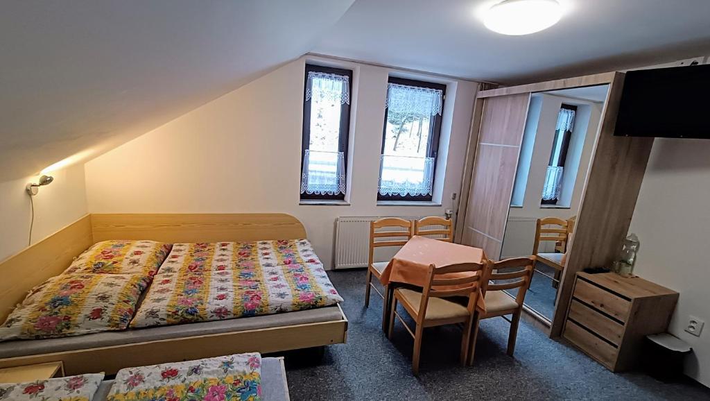 Postel nebo postele na pokoji v ubytování Pension 444 - Ski Resort Herlikovice and Bubakov