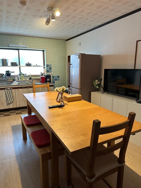 TV a/nebo společenská místnost v ubytování GuestHouse" Ro "Umegato