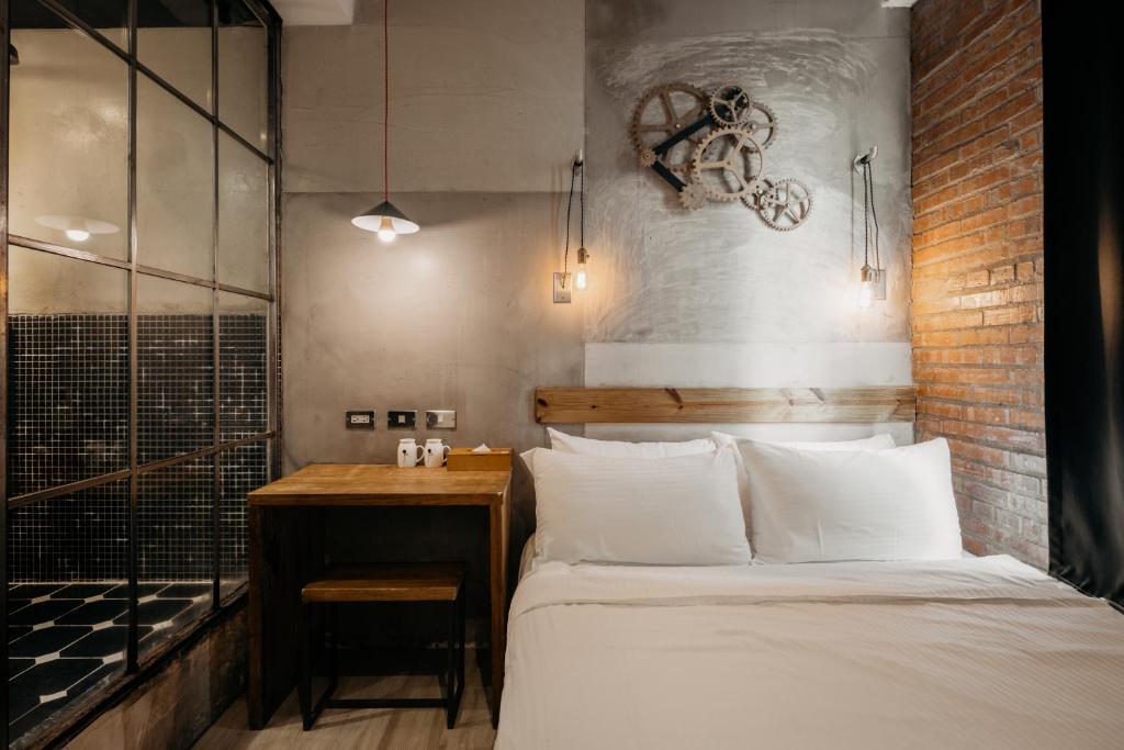 Postel nebo postele na pokoji v ubytování Just Inn 正旅館 台北車站