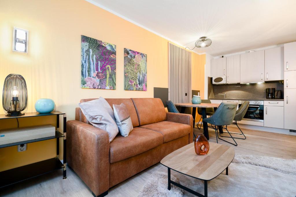 Η κουζίνα ή μικρή κουζίνα στο Das Solaris 7 Beach Apartment mit Balkon, Gemeinschaftssauna und Grillplatz