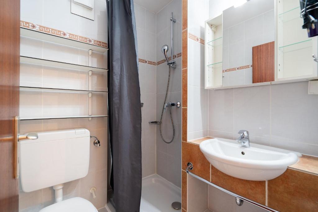 Koupelna v ubytování Das Solaris 5 Beach Apartment mit Balkon, Gemeinschaftssauna und Grillplatz