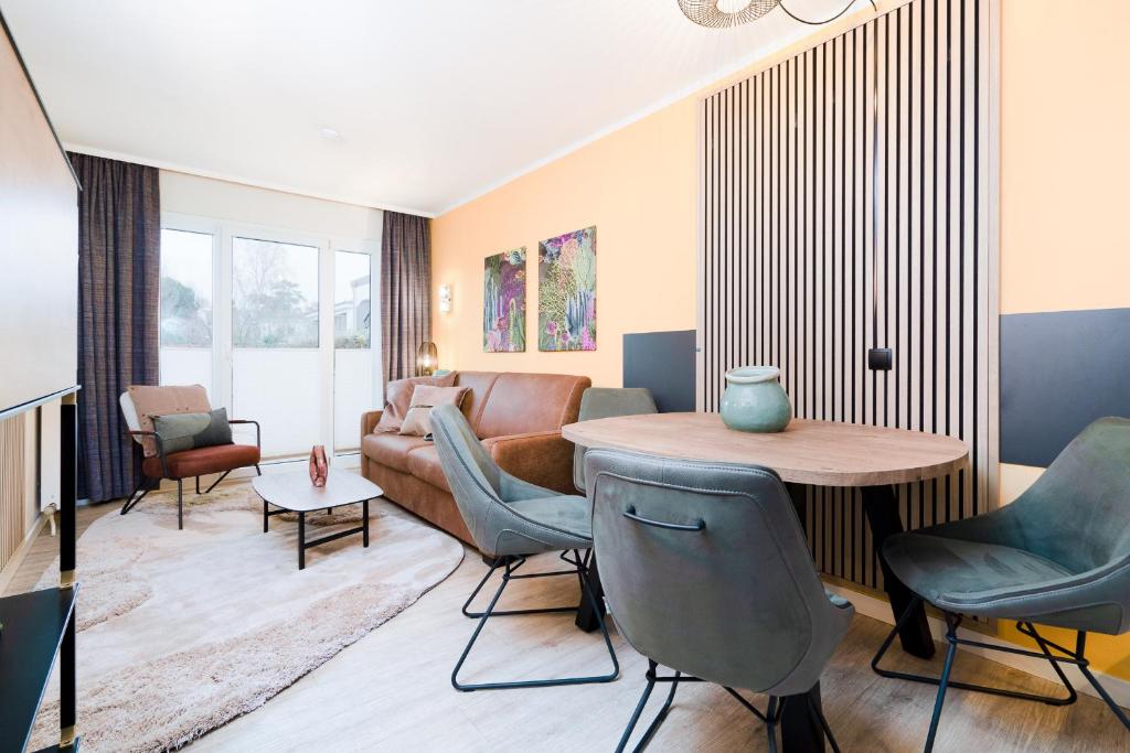 Posezení v ubytování Das Solaris 16 Beach Apartment strandnah und hundefreundlich