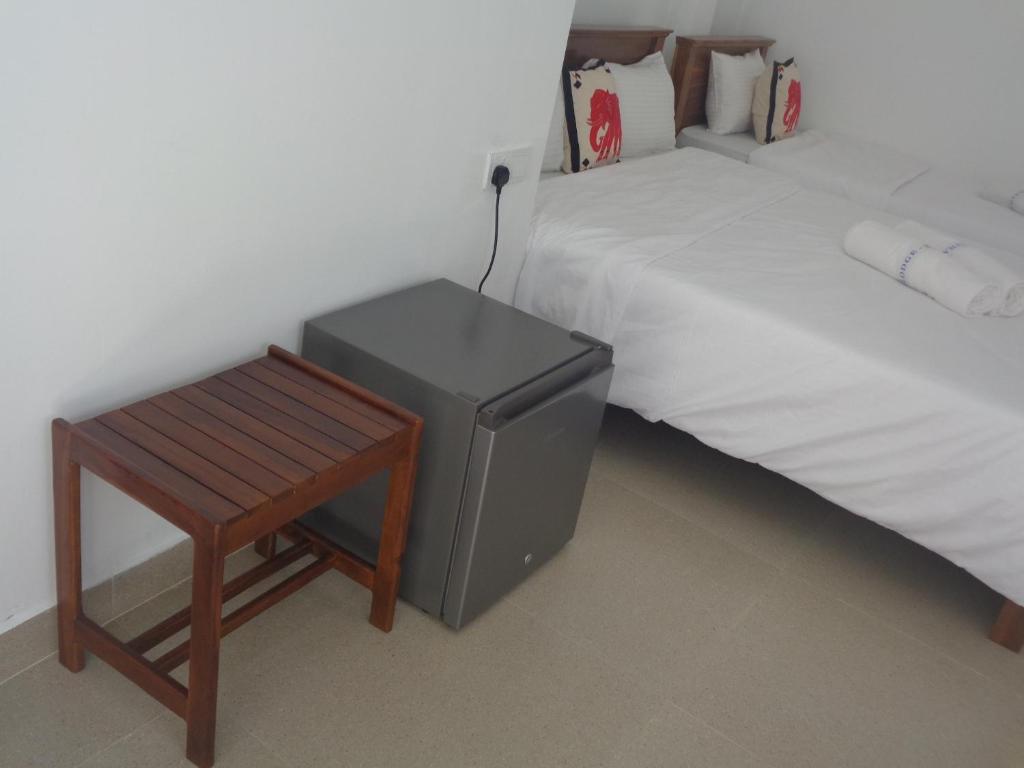 Postel nebo postele na pokoji v ubytování White Lodge