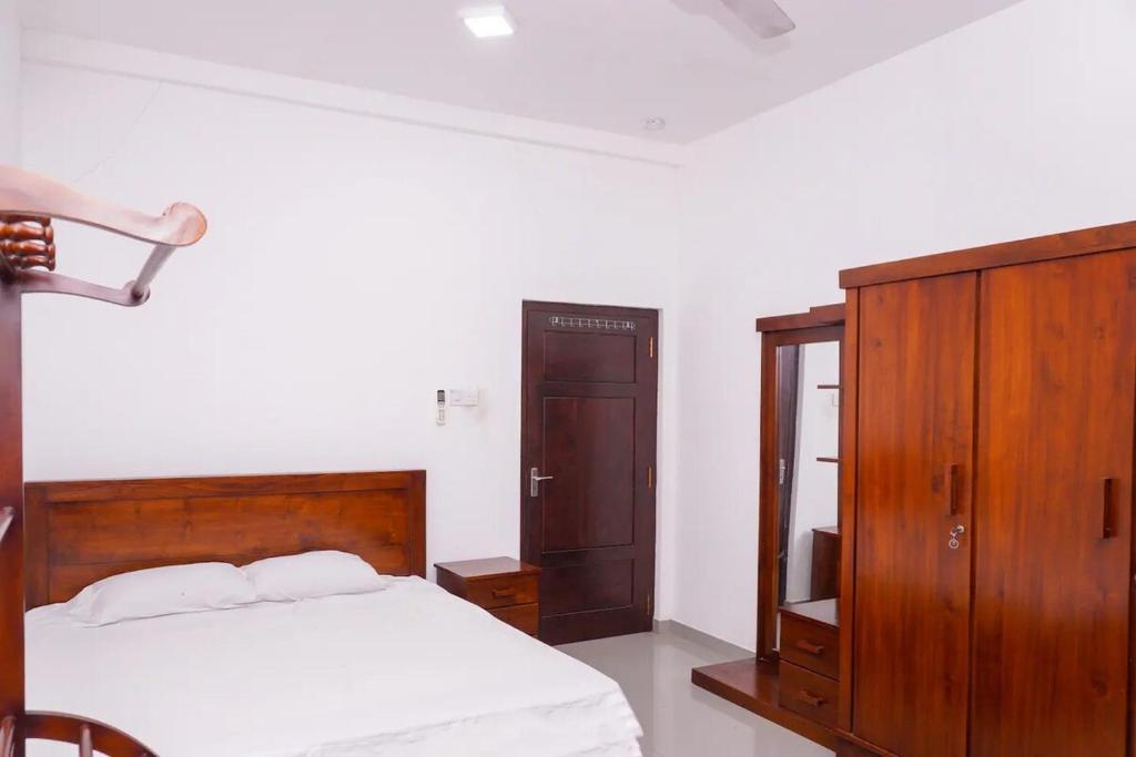 Ένα ή περισσότερα κρεβάτια σε δωμάτιο στο Dawood Villa