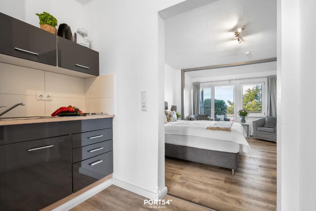 Katil atau katil-katil dalam bilik di Apartment 22