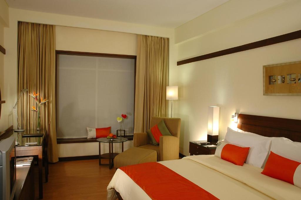 Postel nebo postele na pokoji v ubytování Fortune Select Global, Gurugram - Member ITC Hotels' Group