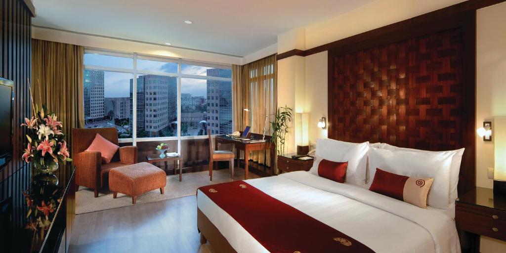 Postel nebo postele na pokoji v ubytování Fortune Select Global, Gurugram - Member ITC Hotels' Group