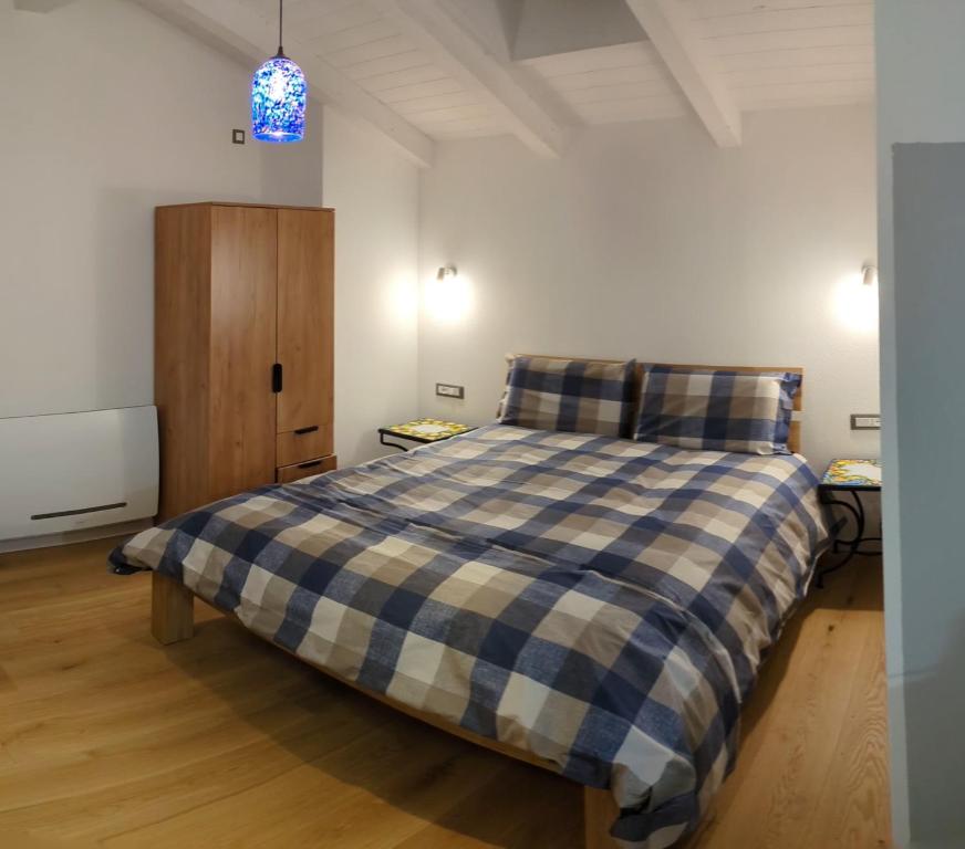 Postel nebo postele na pokoji v ubytování Le Vignole