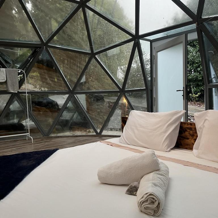 Postel nebo postele na pokoji v ubytování Quinta do Abacate - Glamping Park