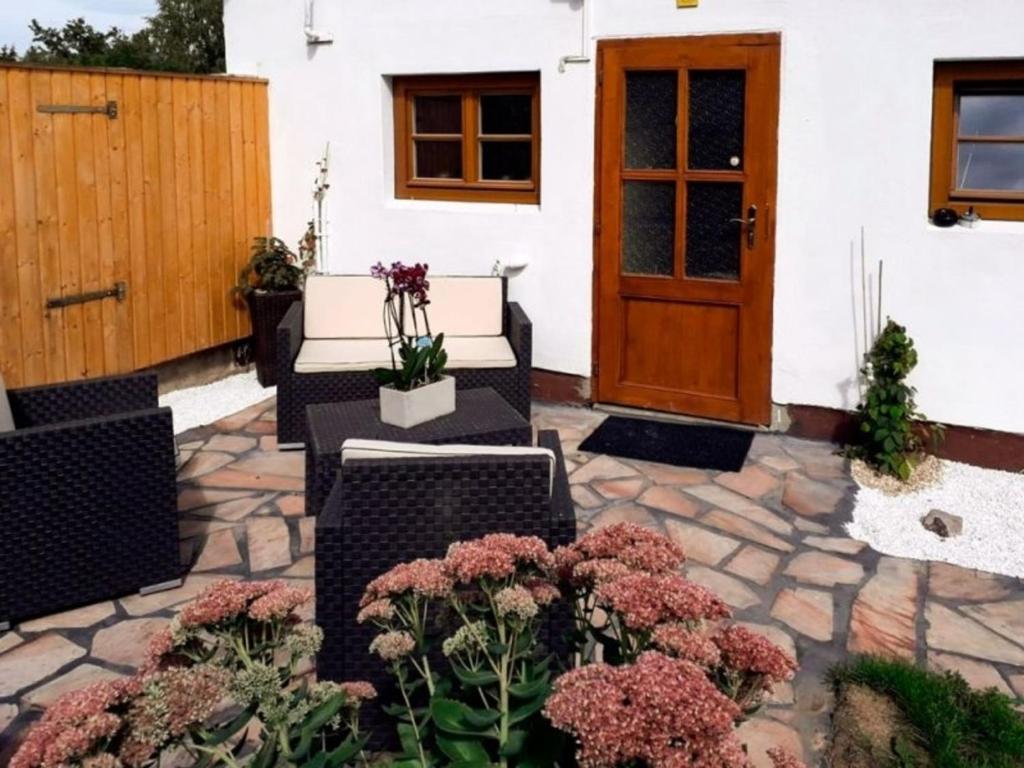 Κήπος έξω από το 1 Zimmer Apartment "Rhumeblümchen"