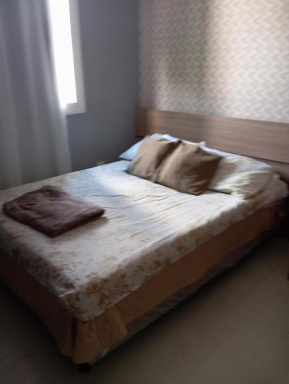 Postel nebo postele na pokoji v ubytování Apto dois quartos Px de tudo ideal pra cop